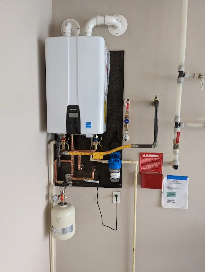 Professional plumber installing copper piping in a Incline Village home